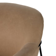 Rounded Brown Leather Accent Chair